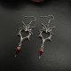 Boucles d'oreilles coeurs chauve-souris gemme rouge